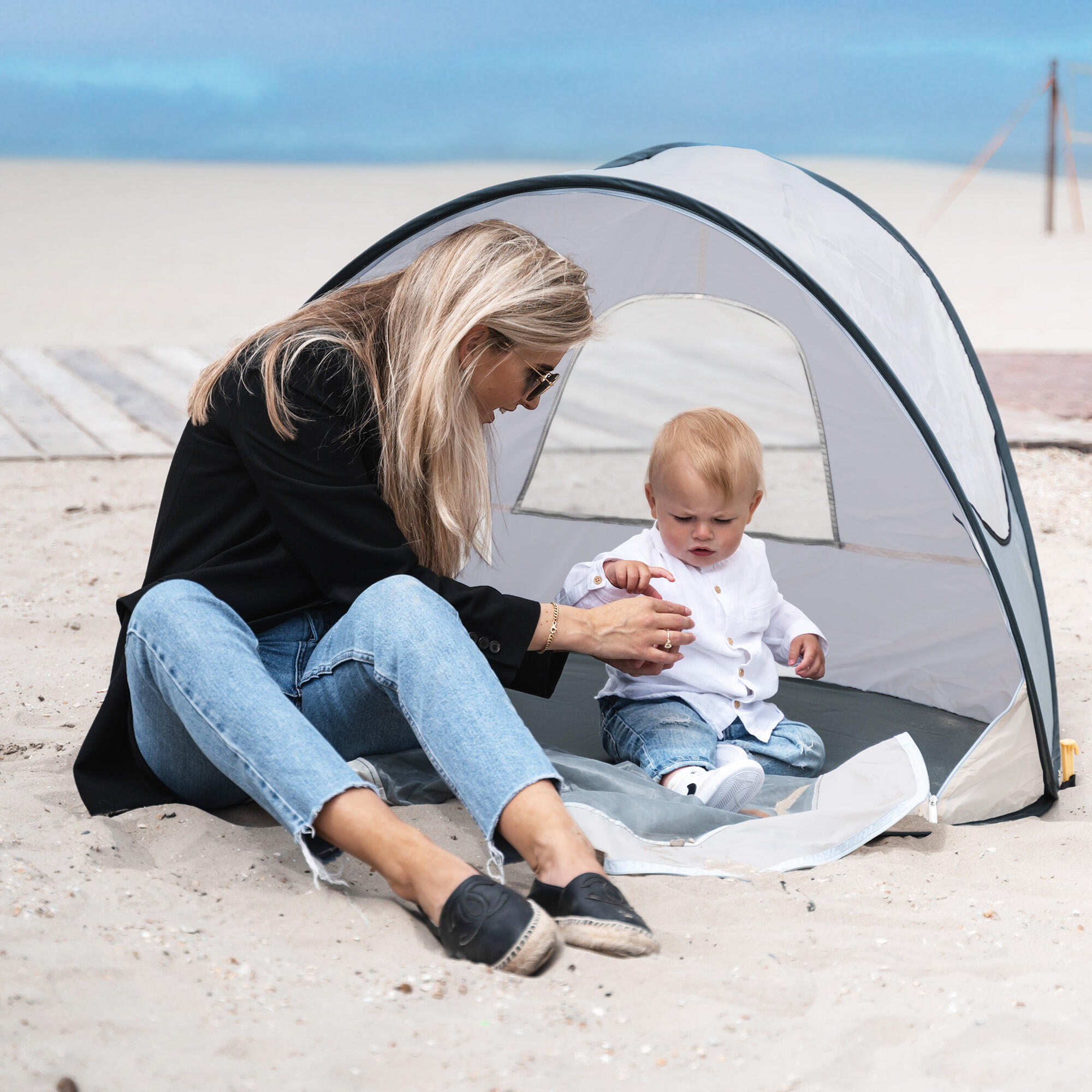 decathlon-tenda-mare-416uhr-1.jpg Tenda da spiaggia Pop Up di Lusso Leggera Protezione UV 50+ Argento | Decathlon - immagine 1